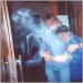 hazy entity in front of two people hugging